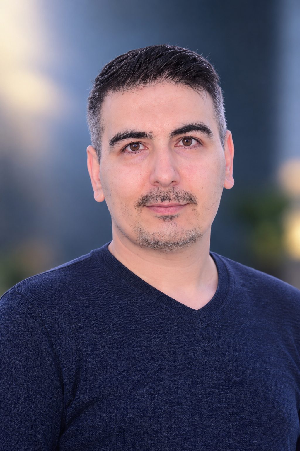 Meraj Hadad in a navy outfit, writer and developer at MHADAD.IR